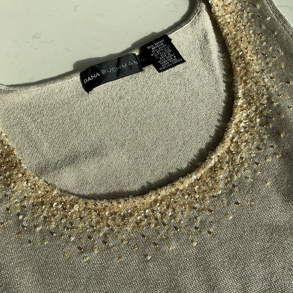 Scoop neck embellished neckline, metallic knit, sleeveless sweater. Size Small